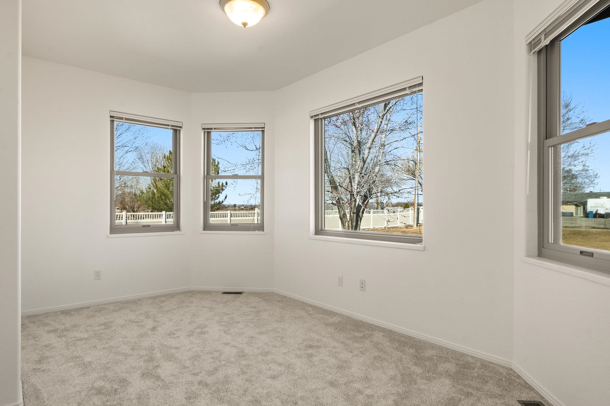 2107 I I- 1/2 Road Grand Junction, CO 81505 - Photo 13 of 42 a view of an empty room with a window