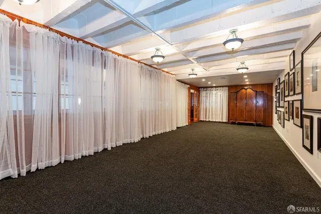 a view of swimming pool with outdoor seating