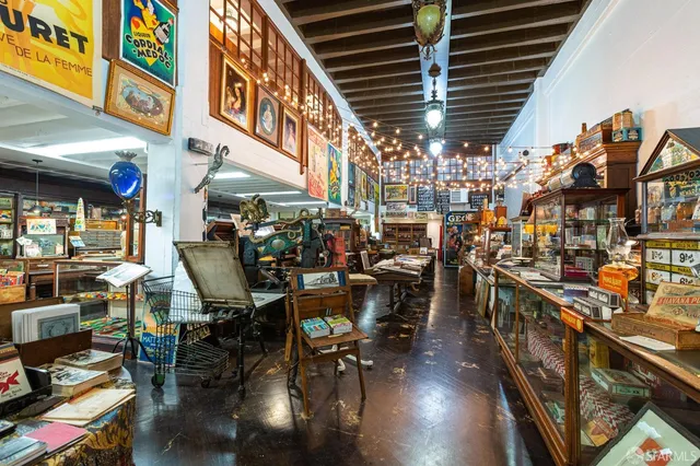 a kitchen with stove and window