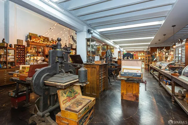 a bed room with a bed and a chandelier