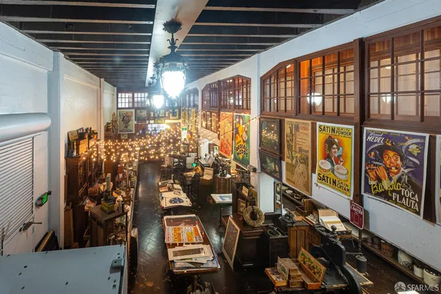 a view of a hallway with workspace