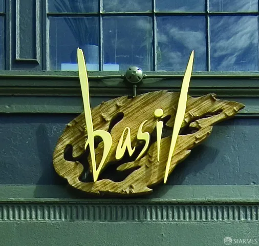 a view of a swimming pool with sitting area