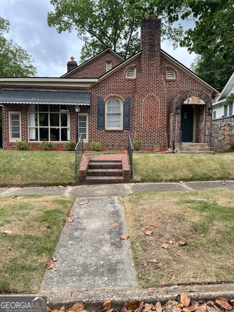 311 3rd Street Manchester, GA 31816 - Photo 62 of 62 a front view of a house with a yard