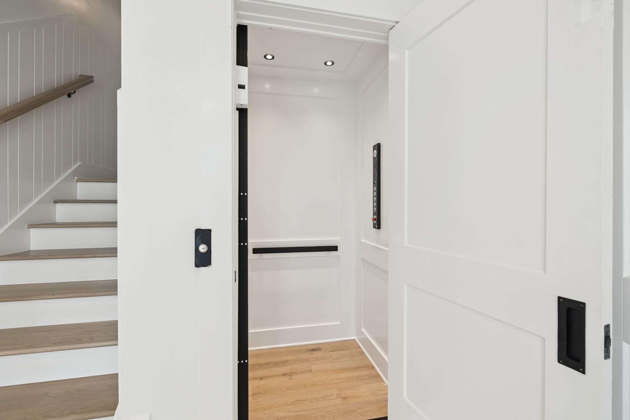 8978 East County Highway Inlet Beach, FL 32461 - Photo 11 of 116 a view of a hallway with wooden floor and staircase