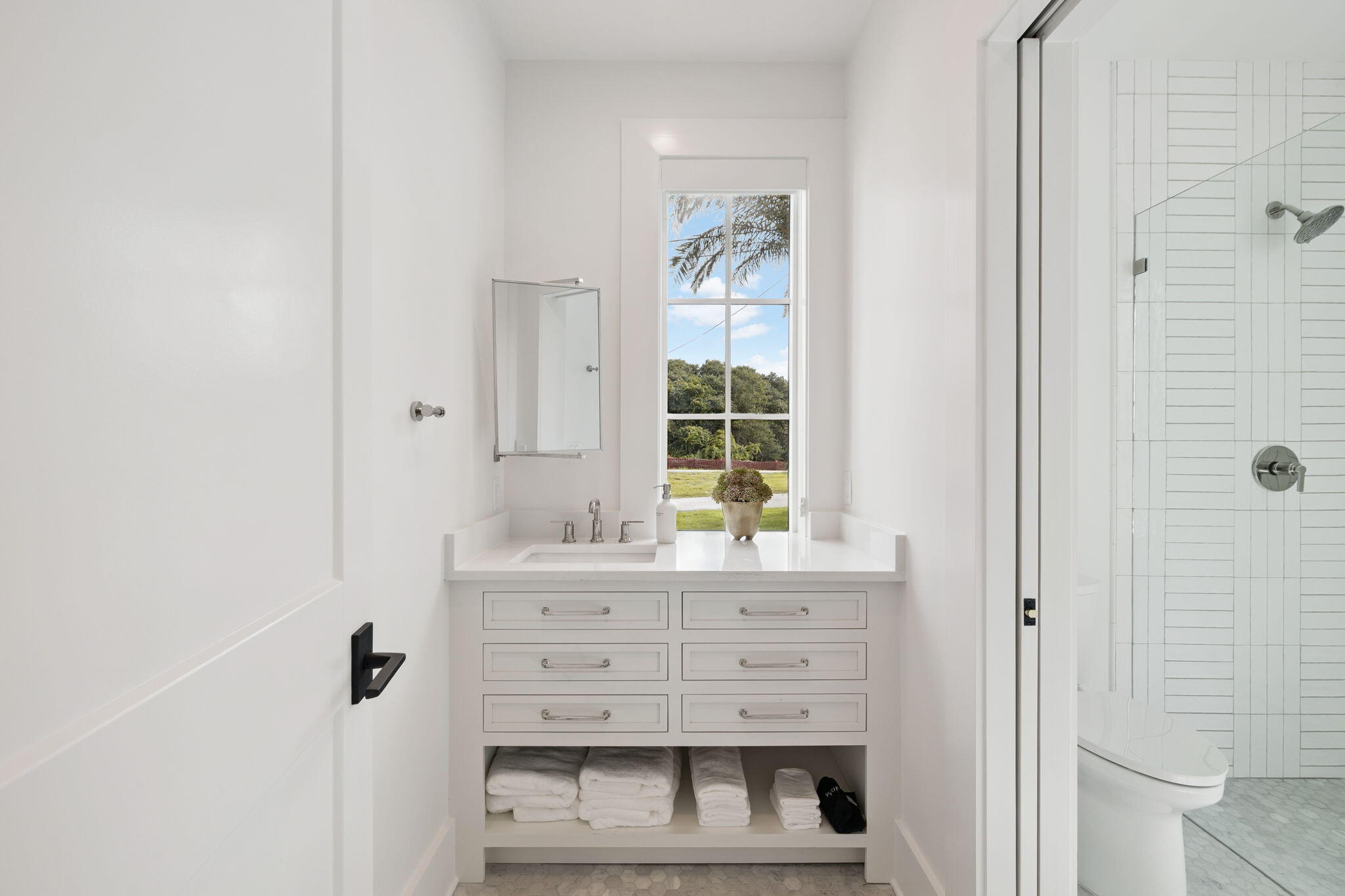 8978 East County Highway Inlet Beach, FL 32461 - Photo 14 of 116 a bathroom with a sink a mirror and a shower