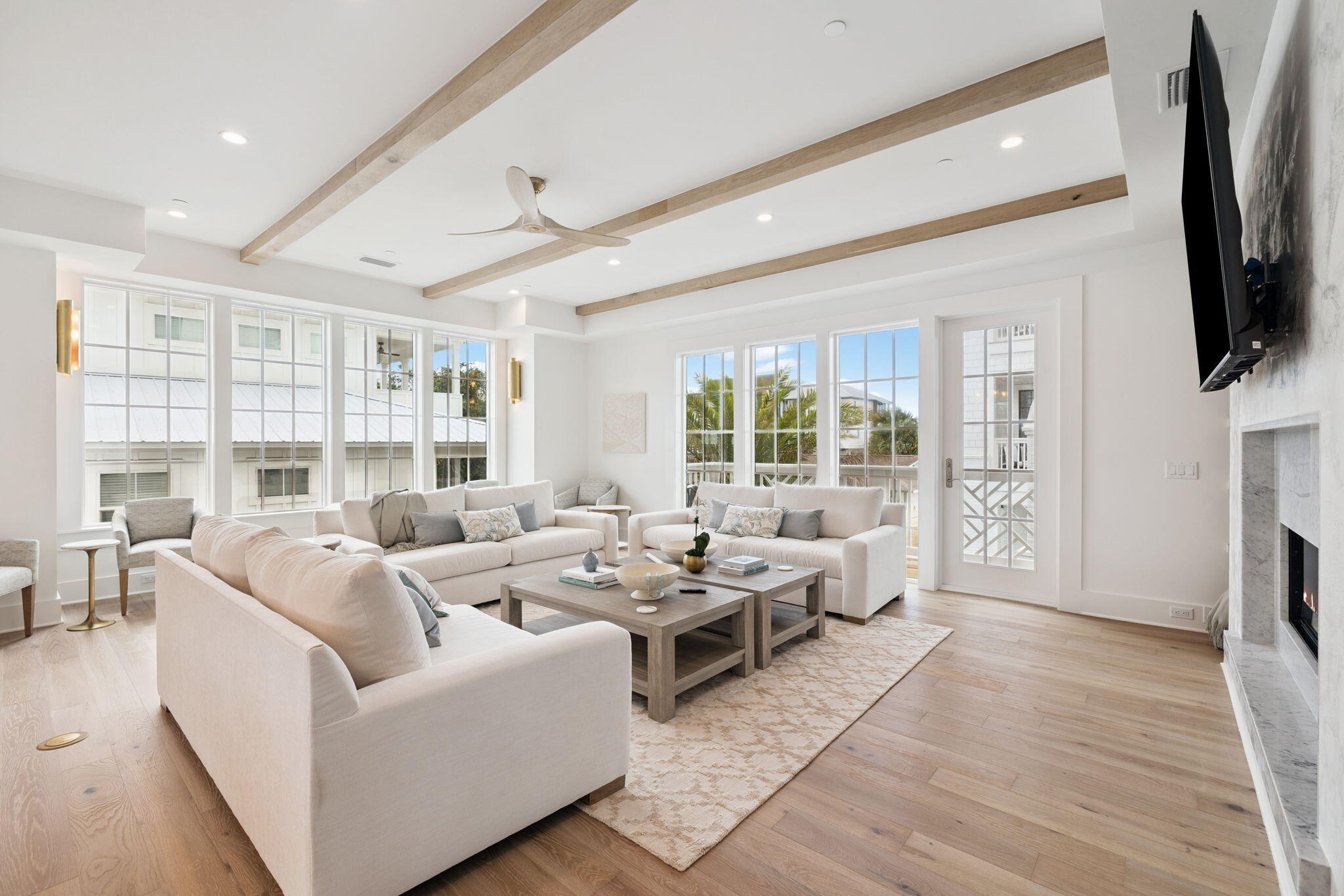 8978 East County Highway Inlet Beach, FL 32461 - Photo 50 of 116 a living room with fireplace furniture and a flat screen tv