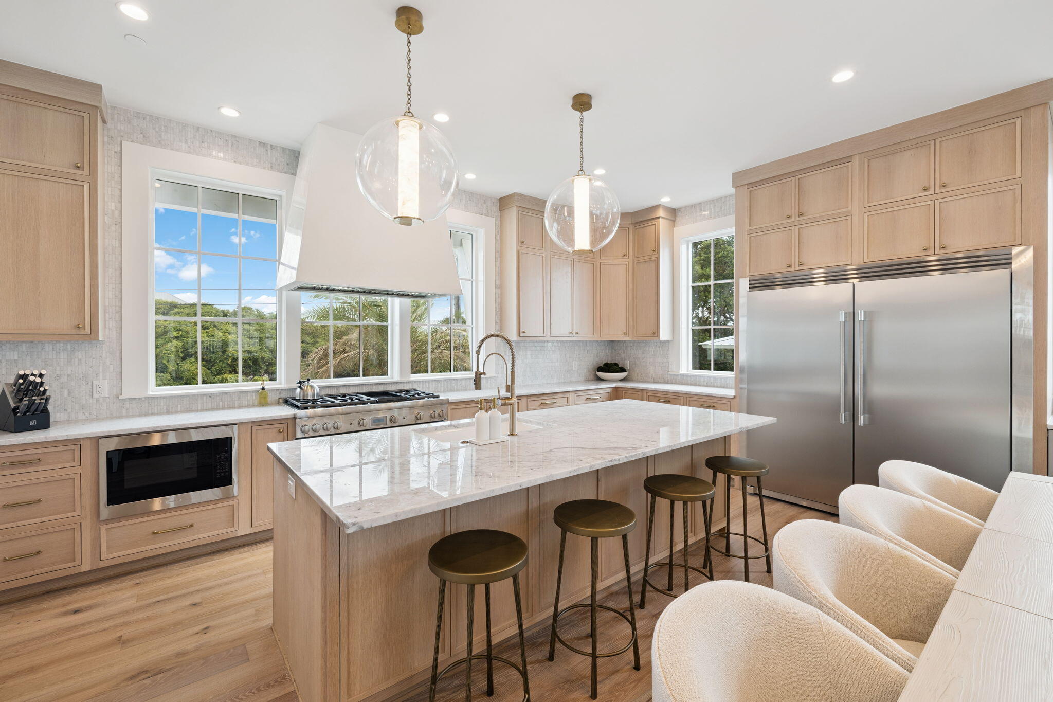 8978 East County Highway Inlet Beach, FL 32461 - Photo 5 of 118 a kitchen with granite countertop a sink a center island stainless steel appliances and cabinets