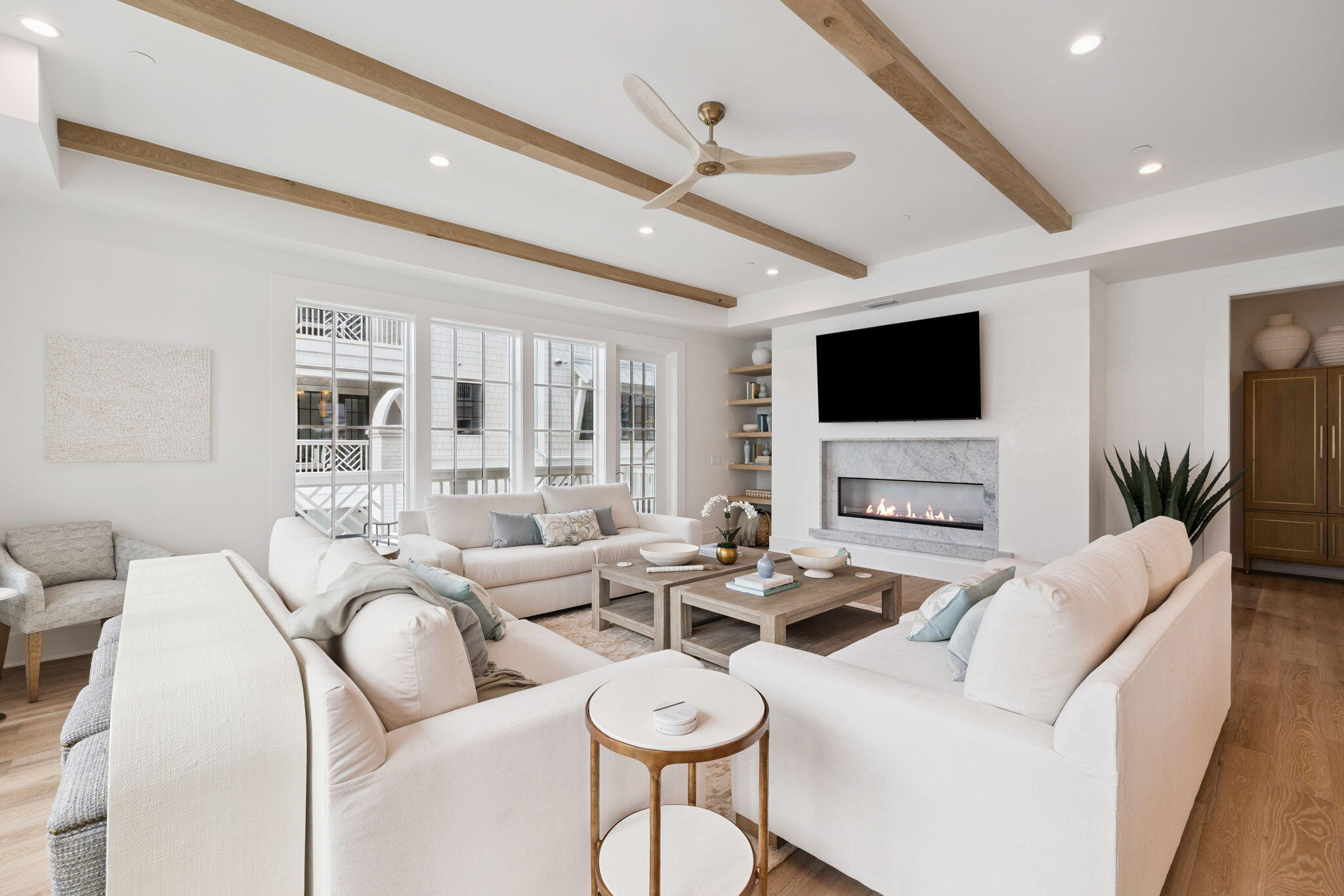 8978 East County Highway Inlet Beach, FL 32461 - Photo 51 of 118 a living room with furniture a flat screen tv and a large window