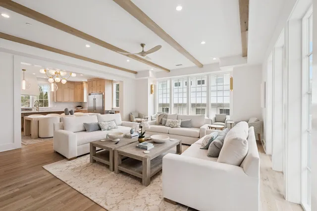 a bathroom with a toilet and a shower curtain
