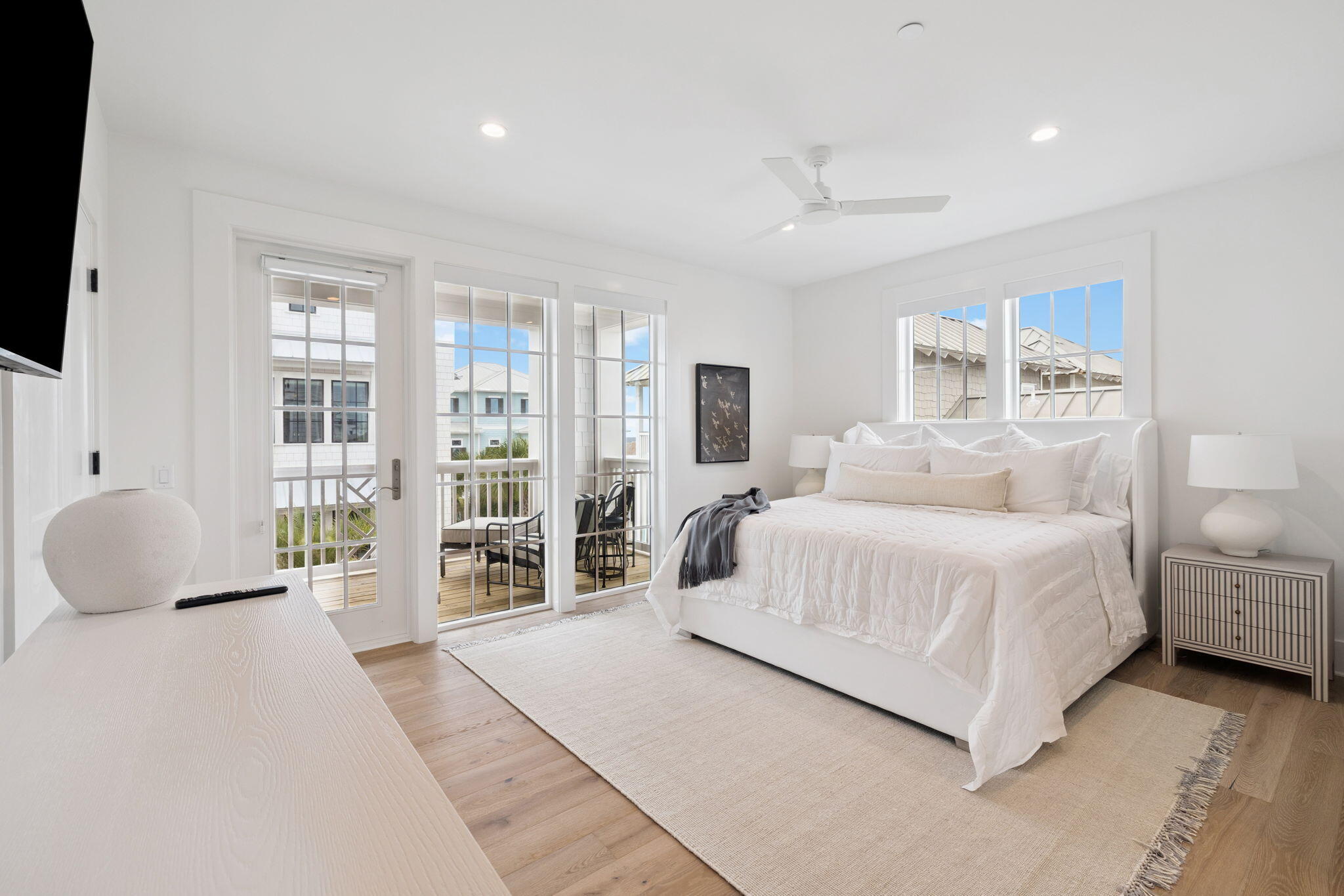 8978 East County Highway Inlet Beach, FL 32461 - Photo 63 of 118 a spacious bedroom with a large bed and a large window