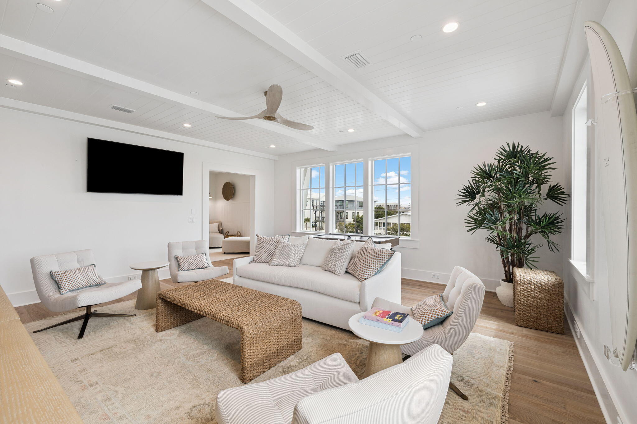 8978 East County Highway Inlet Beach, FL 32461 - Photo 69 of 118 a living room with furniture a flat screen tv and a potted plant