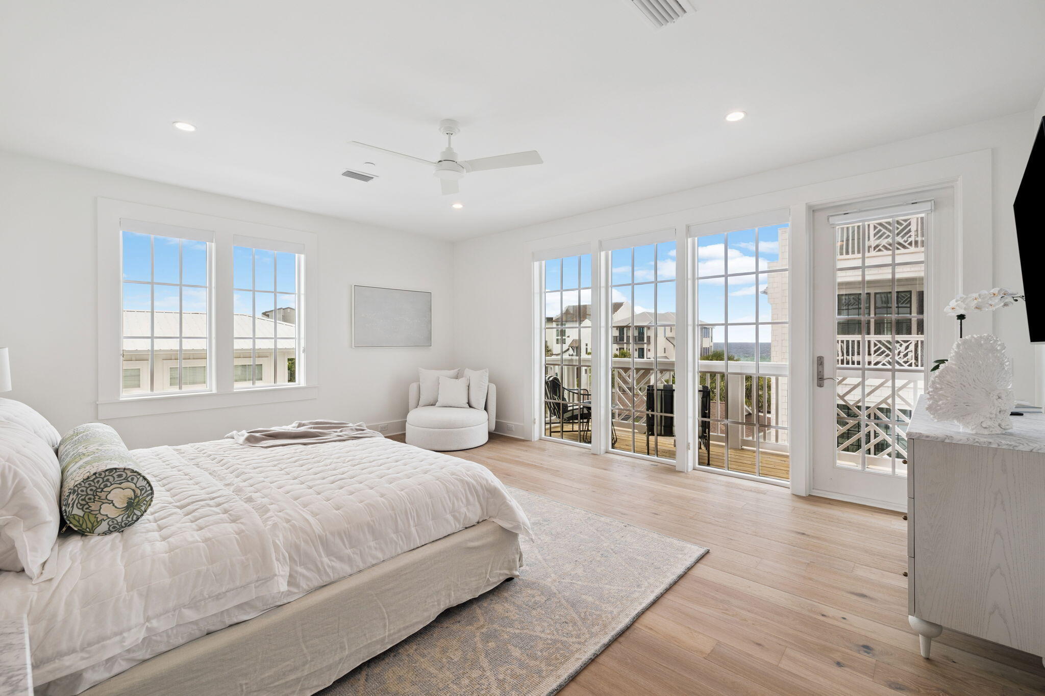 8978 East County Highway Inlet Beach, FL 32461 - Photo 70 of 116 a bedroom with a large bed and a large window