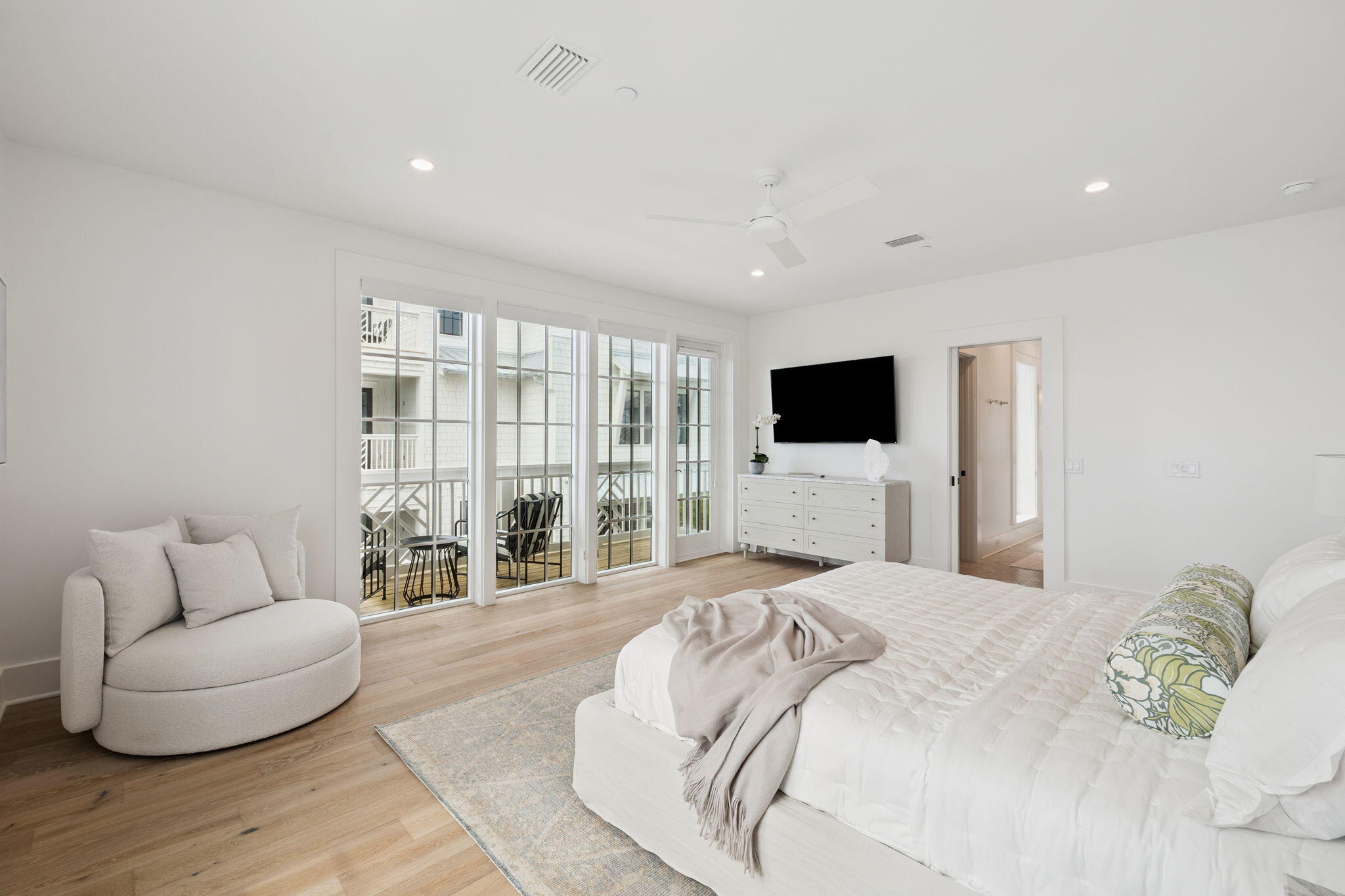8978 East County Highway Inlet Beach, FL 32461 - Photo 71 of 116 a spacious bedroom with a large bed and a flat screen tv