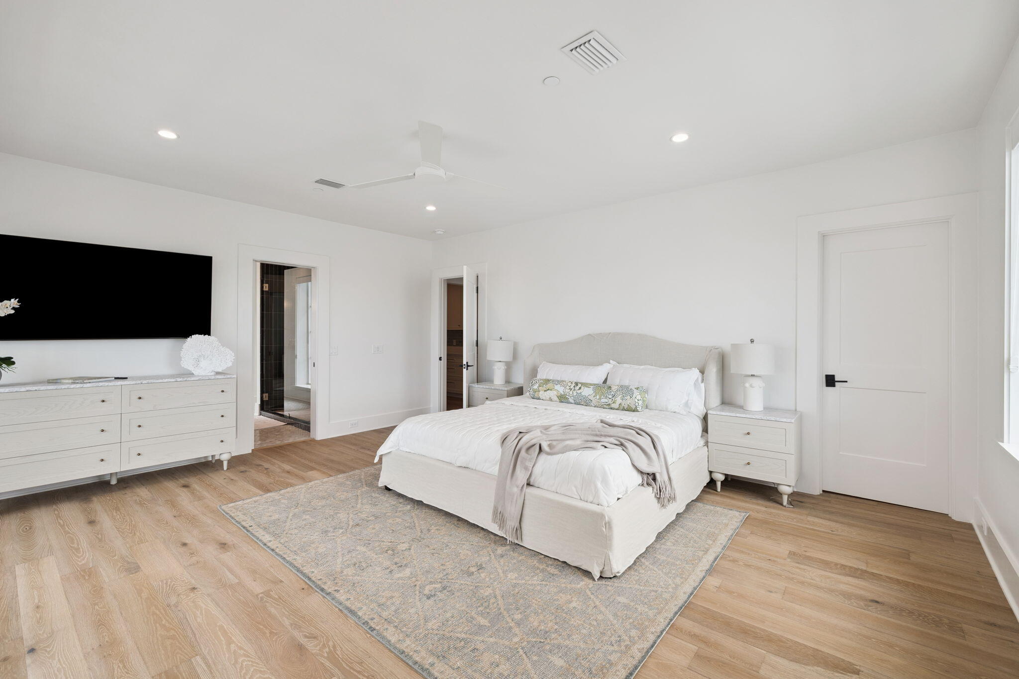 8978 East County Highway Inlet Beach, FL 32461 - Photo 72 of 116 a spacious bedroom with a bed and a flat screen tv