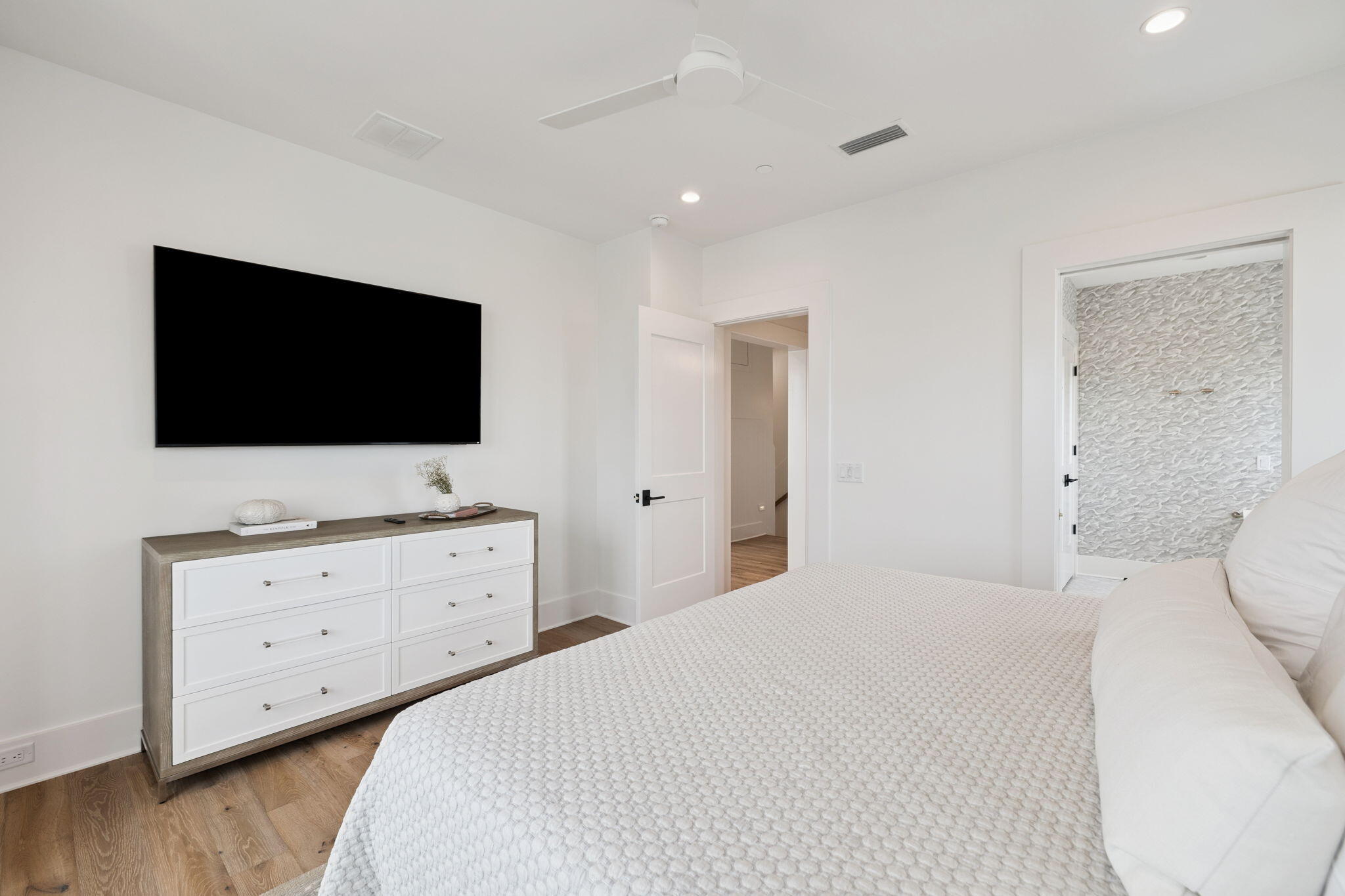 8978 East County Highway Inlet Beach, FL 32461 - Photo 79 of 116 a bedroom with a bed and flat screen tv