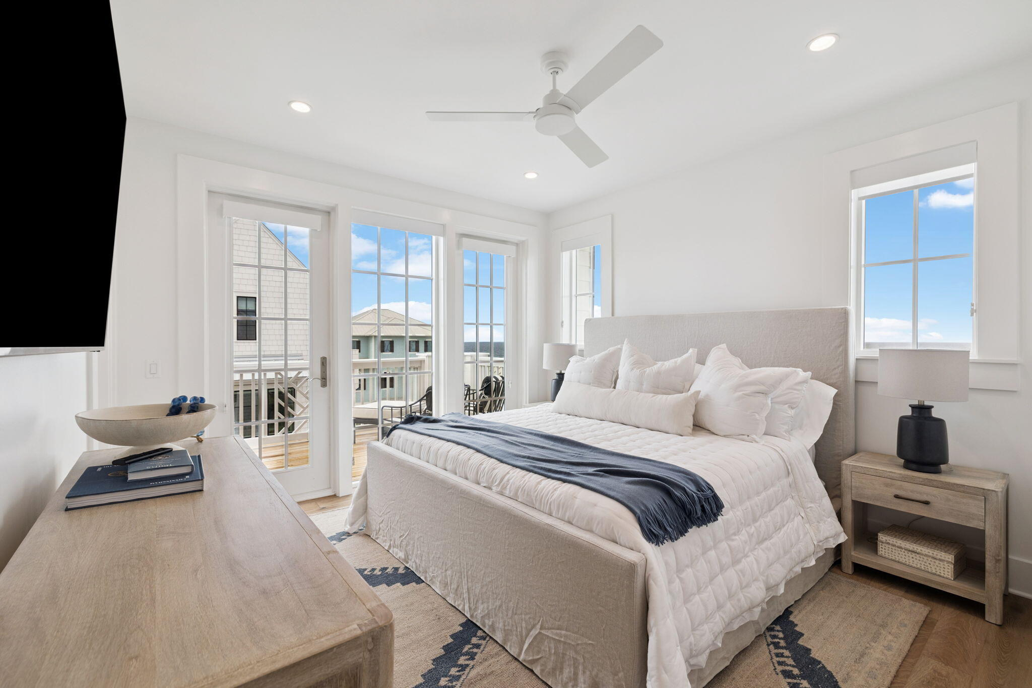 8978 East County Highway Inlet Beach, FL 32461 - Photo 83 of 116 a bedroom with a bed and wooden floor