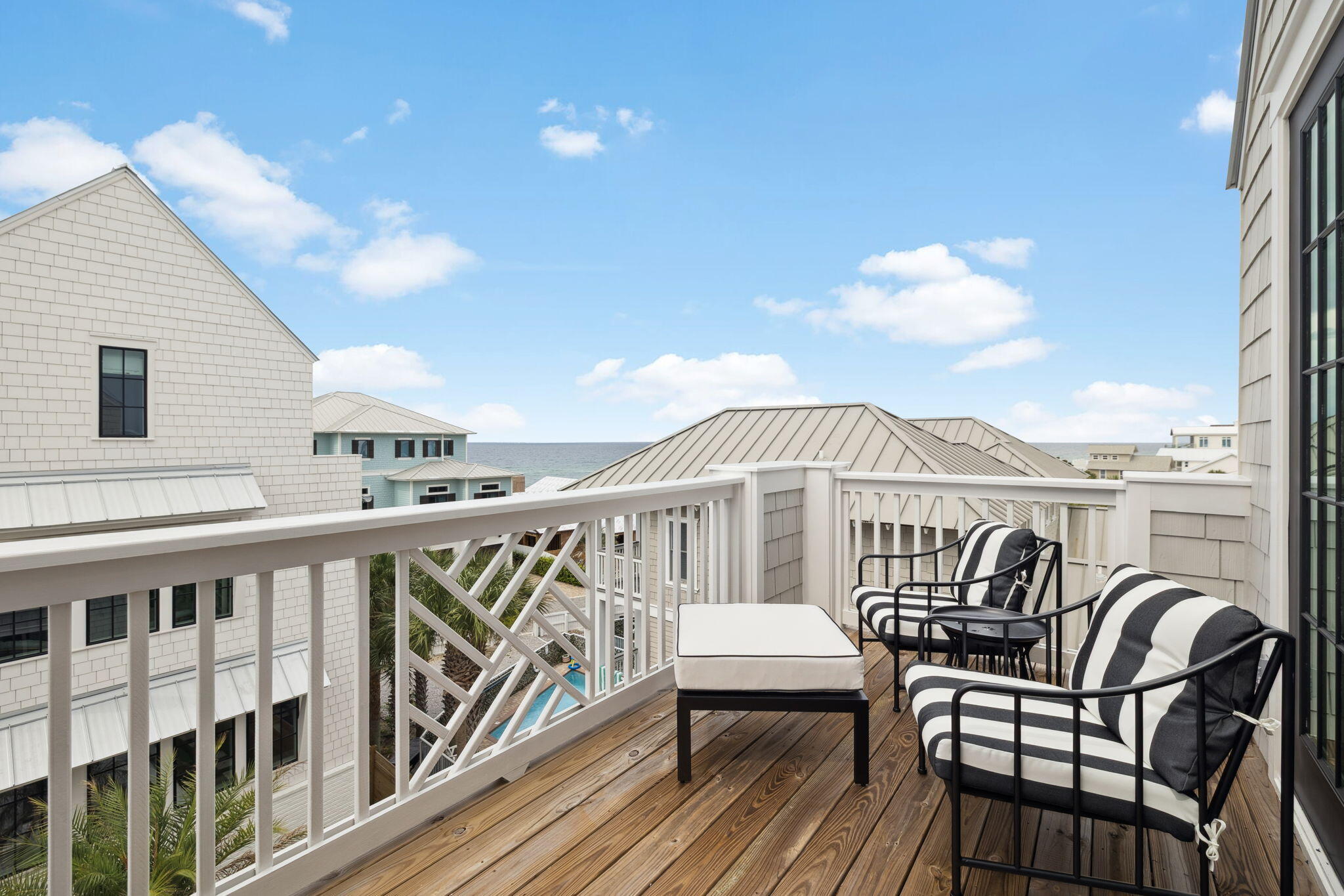 8978 East County Highway Inlet Beach, FL 32461 - Photo 87 of 116 a view of a chair and table on the roof deck