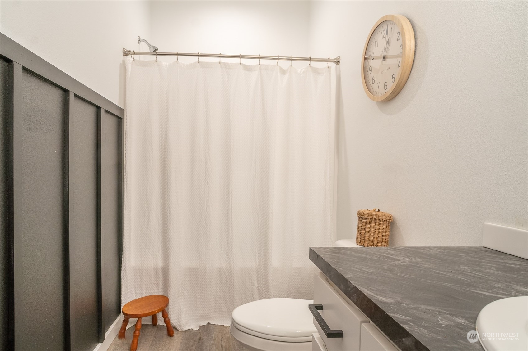 703 D Street Vader, WA 98593 - Photo 29 of 39 a bathroom with a granite countertop toilet and a sink