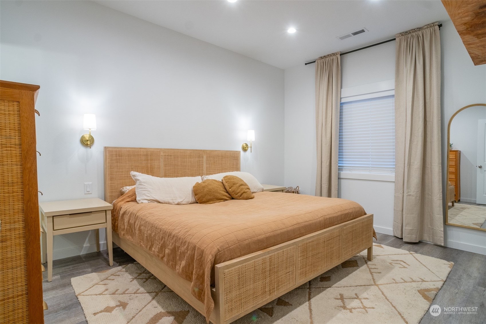 703 D Street Vader, WA 98593 - Photo 31 of 39 a bedroom with a bed and a refrigerator