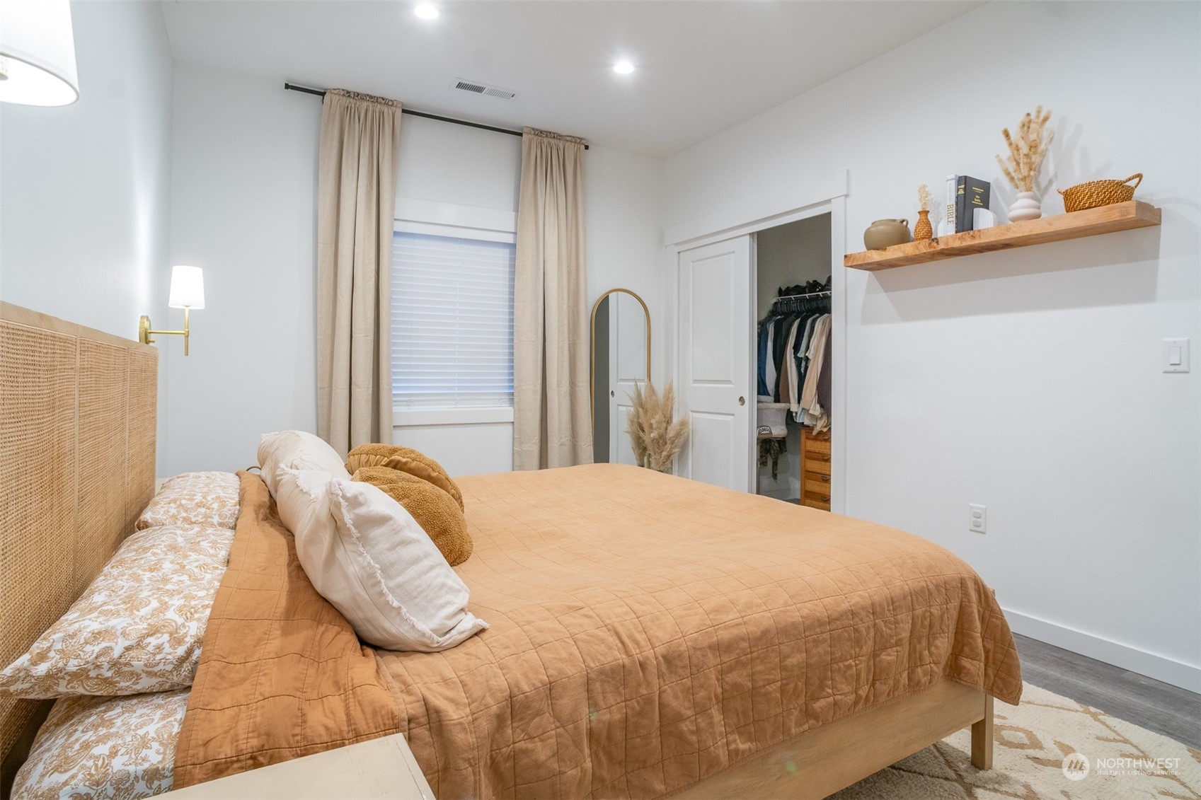 703 D Street Vader, WA 98593 - Photo 32 of 39 a bedroom with a bed and a closet