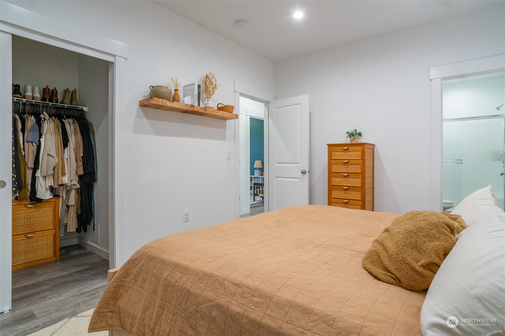 703 D Street Vader, WA 98593 - Photo 34 of 39 a bedroom with a bed and a closet