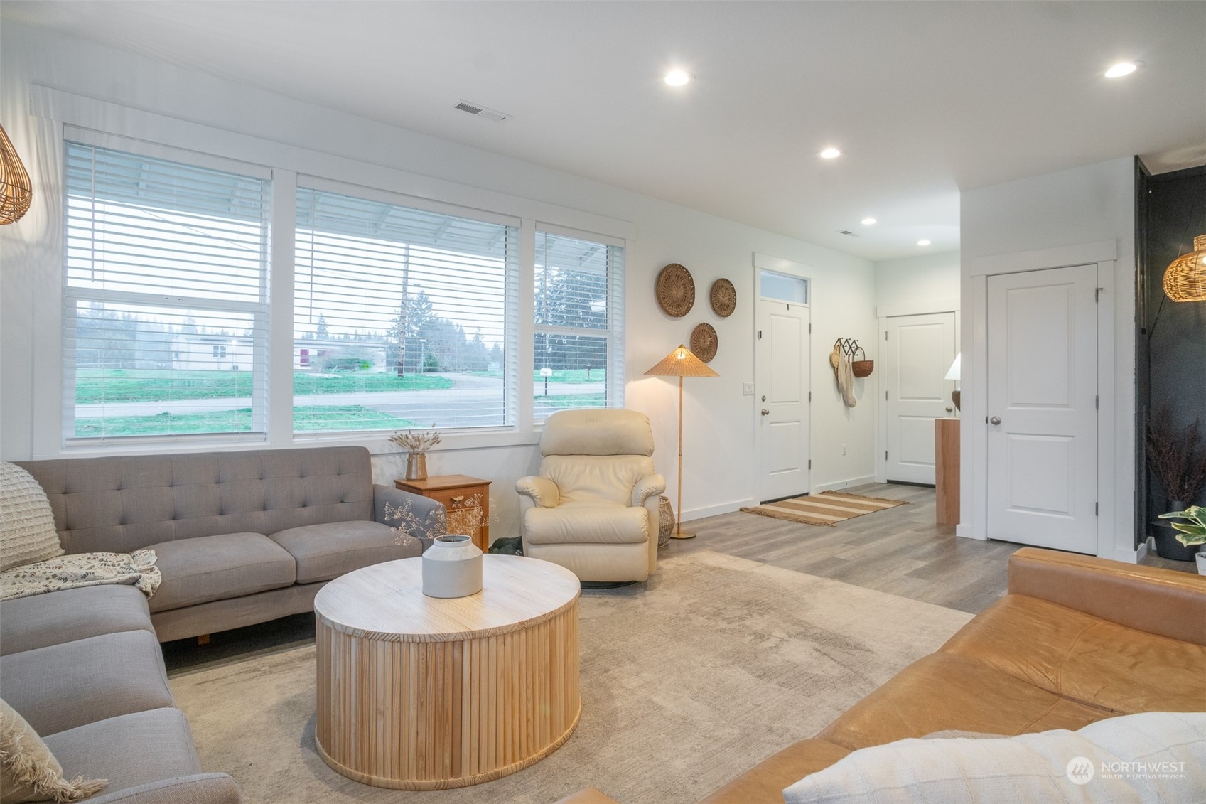 703 D Street Vader, WA 98593 - Photo 8 of 39 a living room with furniture and a large window