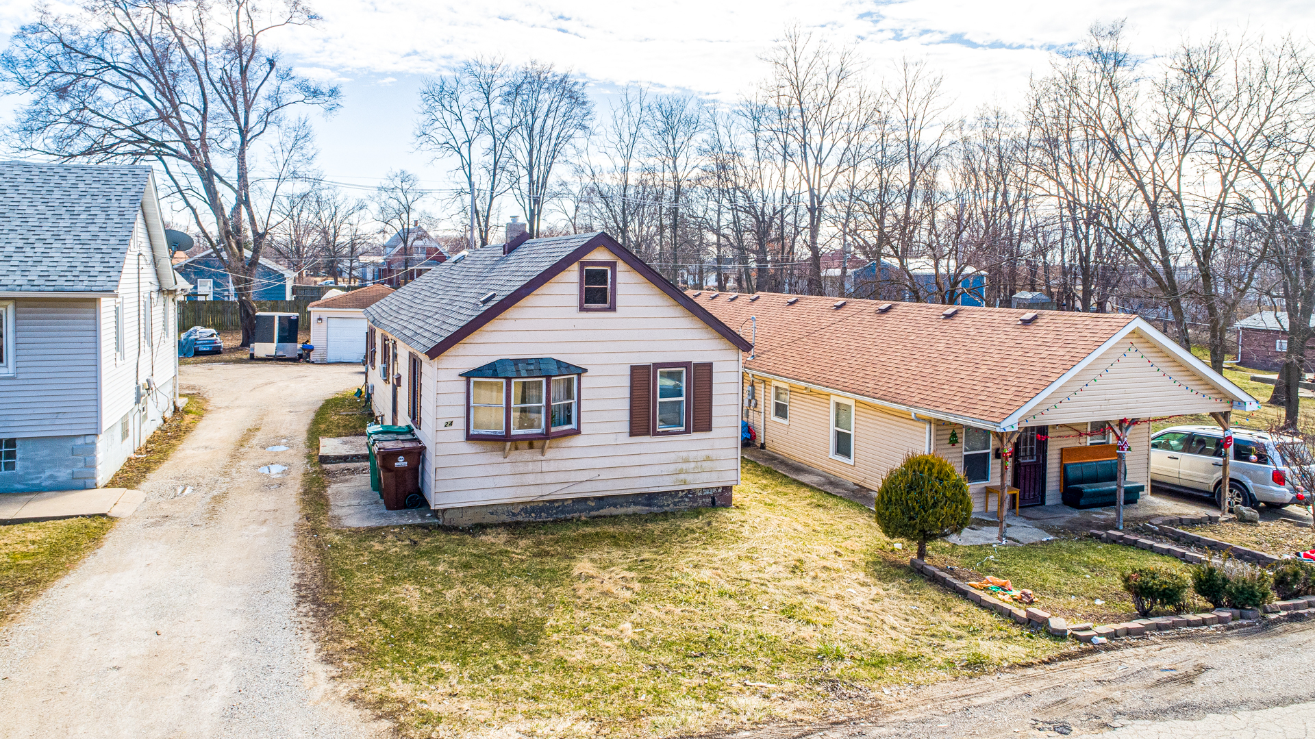 124 Barry Avenue Lockport, IL 60441 - Photo 2 of 9 a front view of a house with a yard covered in snow