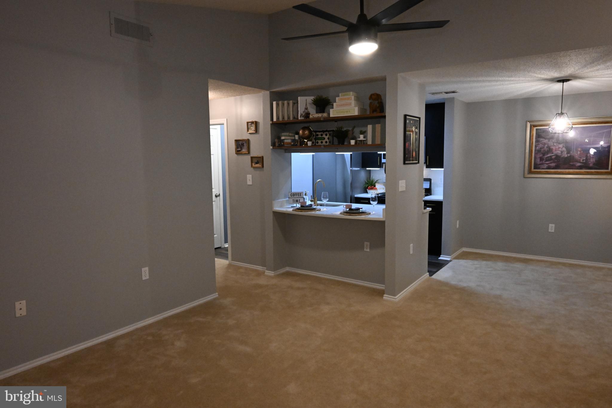 20965 Timber Ridge Terrace, Unit 304 Ashburn, VA 20147 - Photo 20 of 61 a view of kitchen and refrigerator