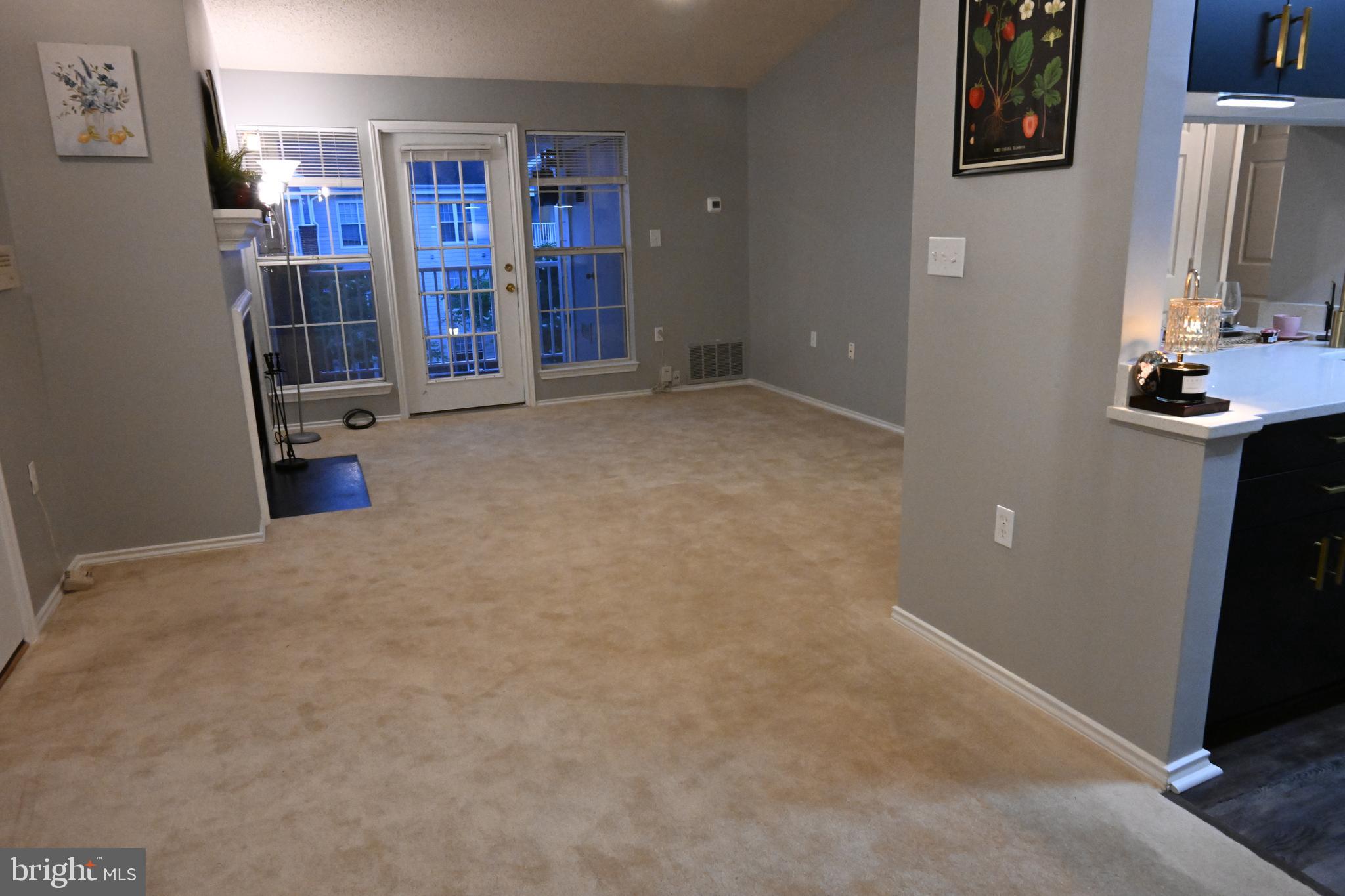 20965 Timber Ridge Terrace, Unit 304 Ashburn, VA 20147 - Photo 61 of 61 an empty room with shelves