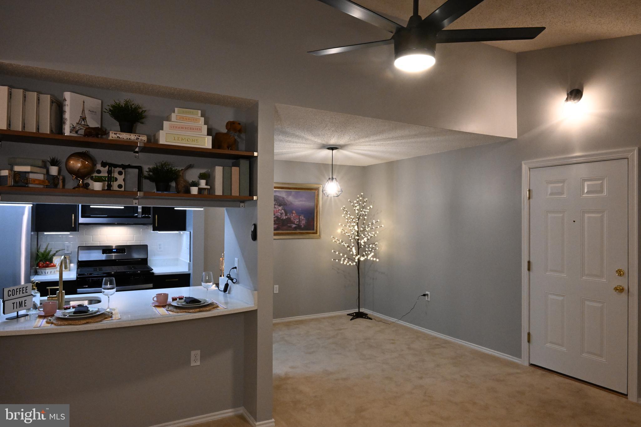 20965 Timber Ridge Terrace, Unit 304 Ashburn, VA 20147 - Photo 27 of 61 a view of a kitchen