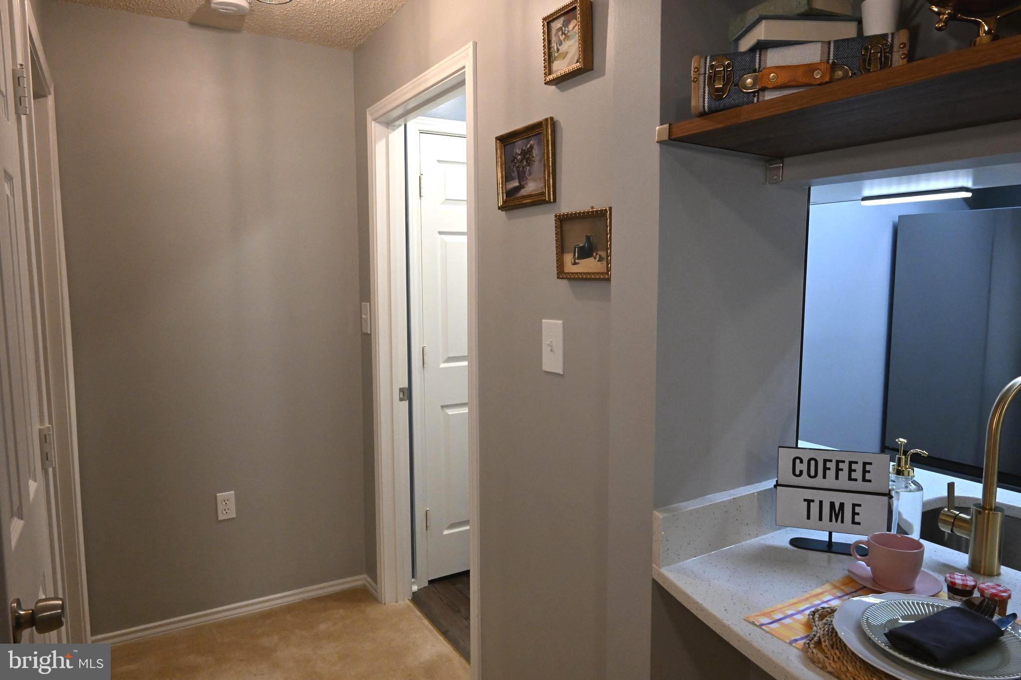 20965 Timber Ridge Terrace, Unit 304 Ashburn, VA 20147 - Photo 33 of 61 a room with storage and utility