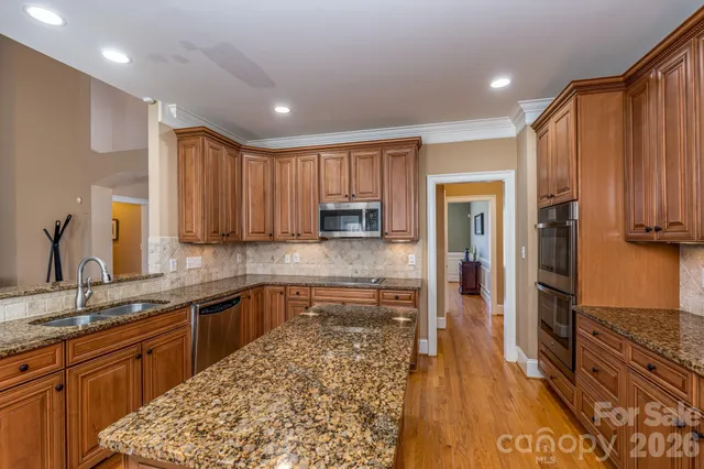 a large kitchen with cabinets