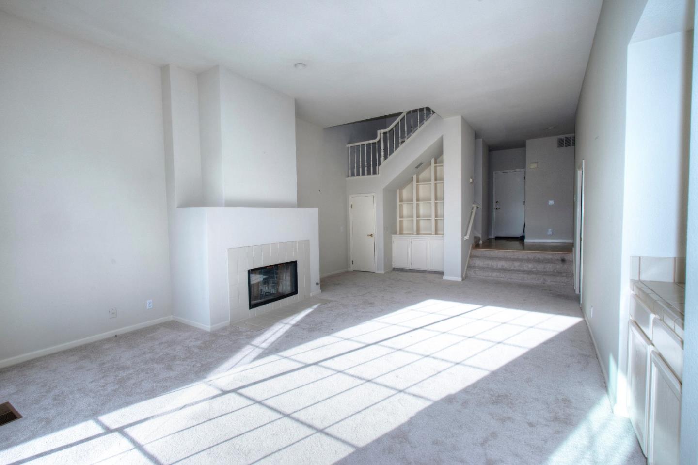 21 Merion Road Half Moon Bay, CA 94019 - Photo 9 of 17 a view of a livingroom with a fireplace and window