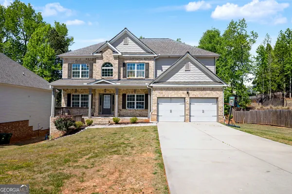 a front view of a house with patio