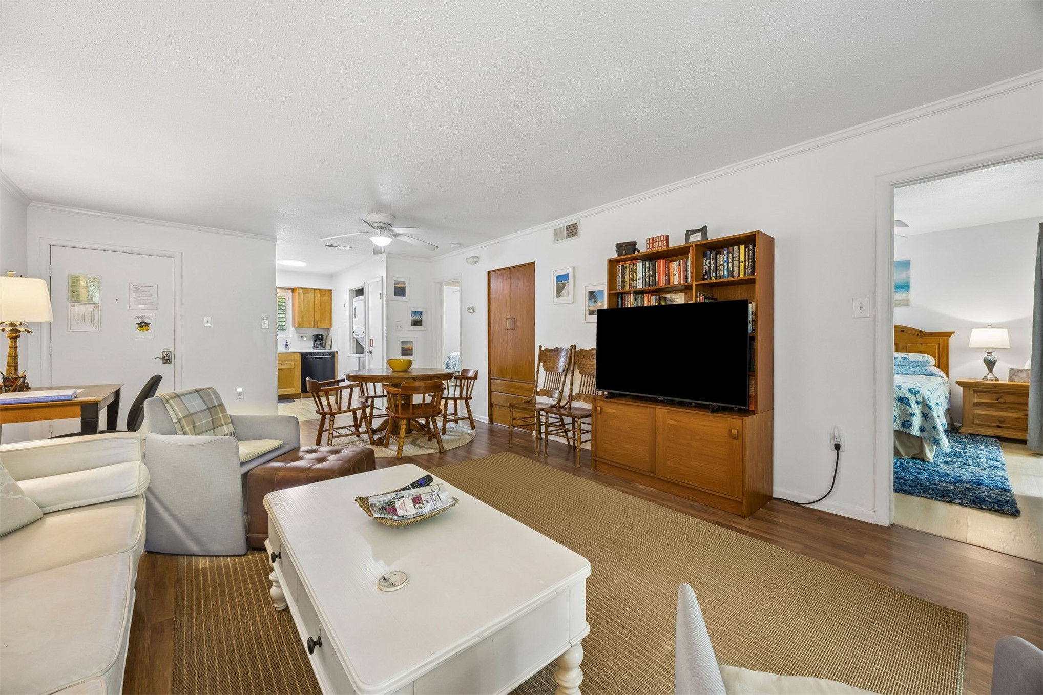 2328 Sadler Road, Unit 1C Fernandina Beach, FL 32034 - Photo 7 of 49 a living room with furniture and a flat screen tv
