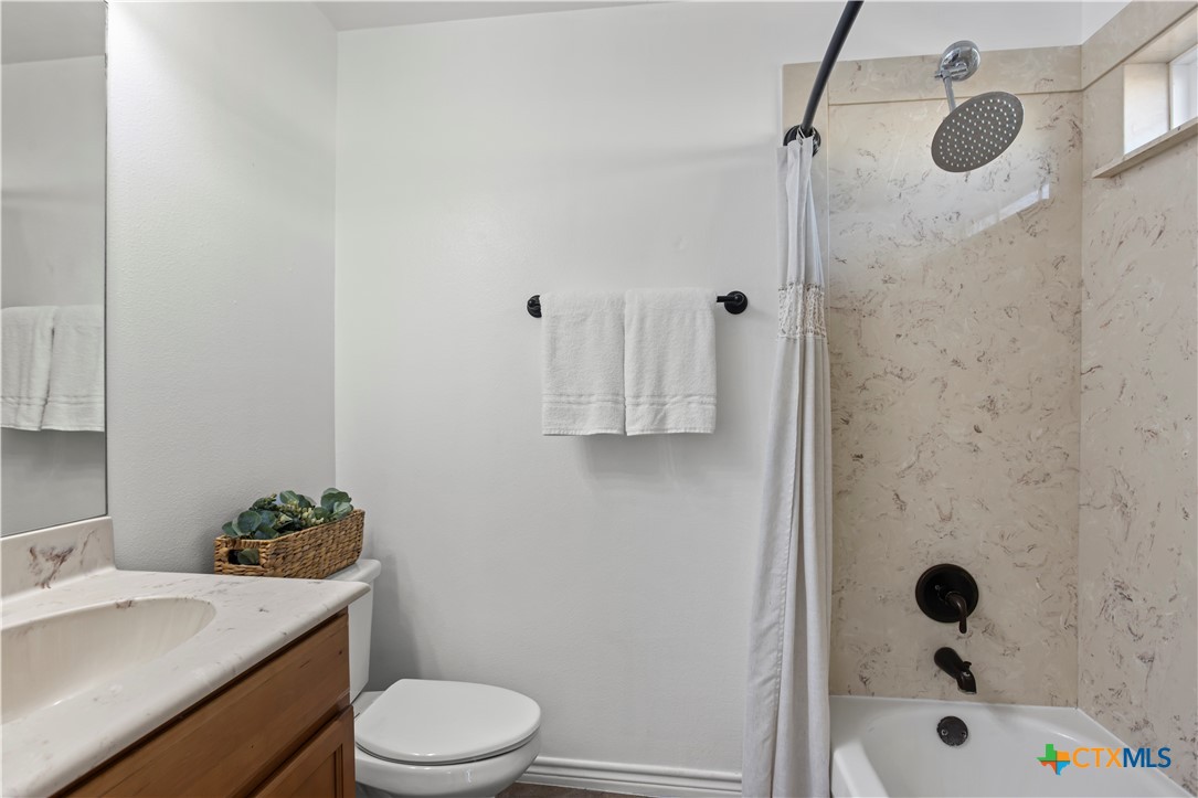 519 Pleasant View Road Troy, TX 76579 - Photo 17 of 33 a bathroom with a sink toilet and shower