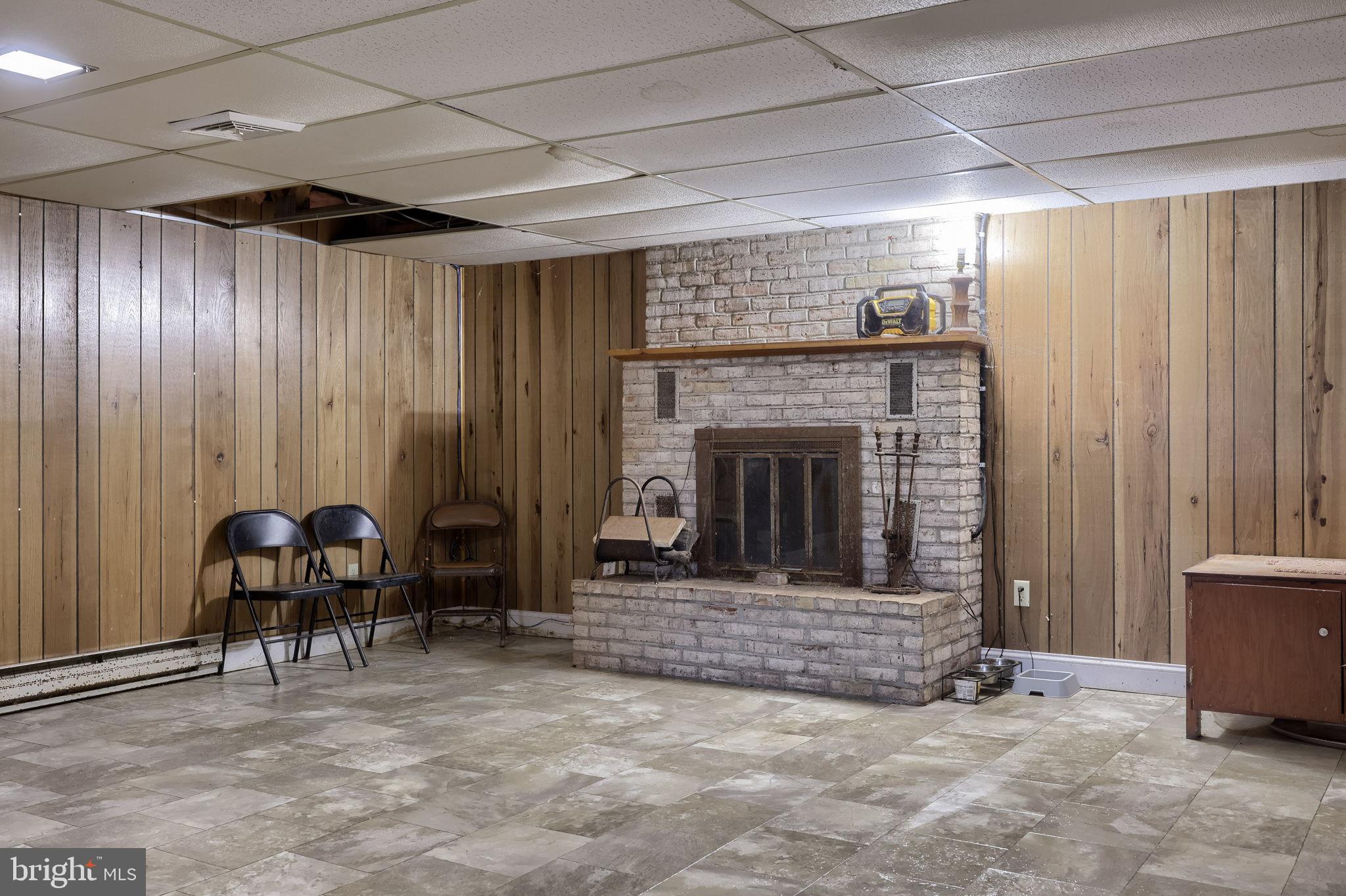 1019 Spring Valley Road Quarryville, PA 17566 - Photo 27 of 36 Cozy basement retreat with rustic charm.