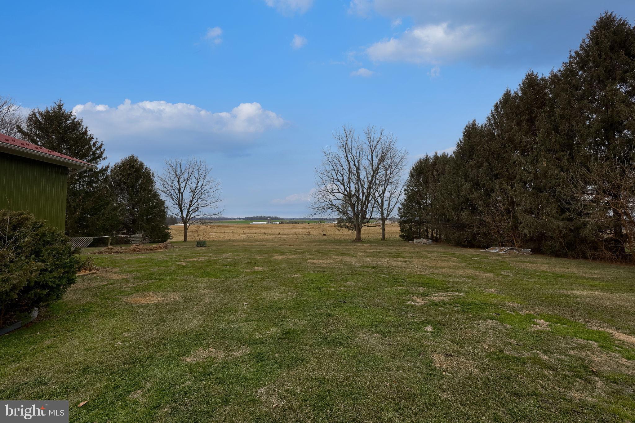1019 Spring Valley Road Quarryville, PA 17566 - Photo 28 of 36 Expansive green space under a vast sky.