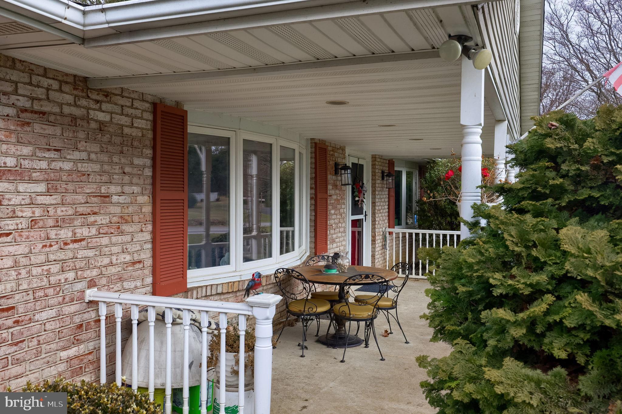 1019 Spring Valley Road Quarryville, PA 17566 - Photo 33 of 36 Charming porch with inviting outdoor seating.