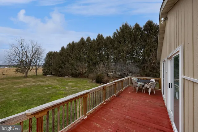 a view of a balcony with mountain view