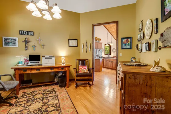 a workspace with furniture and window