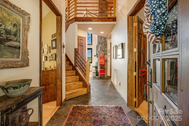 a view of an entryway with a workspace