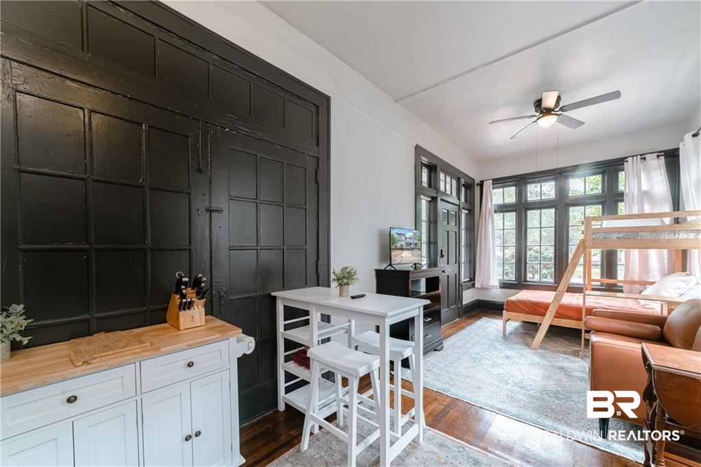 207 Michigan Avenue Mobile, AL 36604 - Photo 16 of 31 Dining area featuring dark wood finished floors and a ceiling fan
