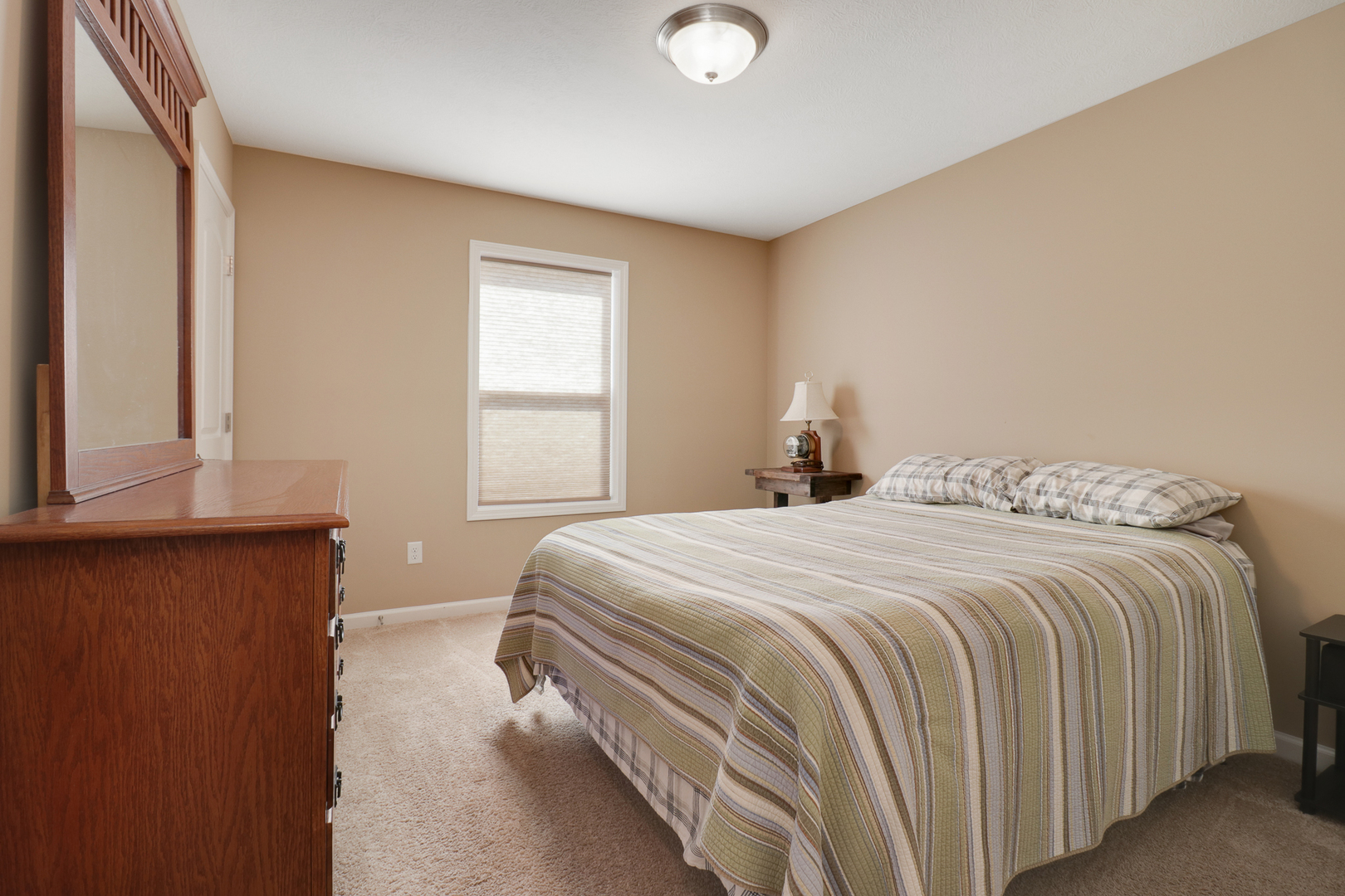 51 Winding Way Bloomington, IL 61705 - Photo 13 of 39 a bedroom with a bed and window