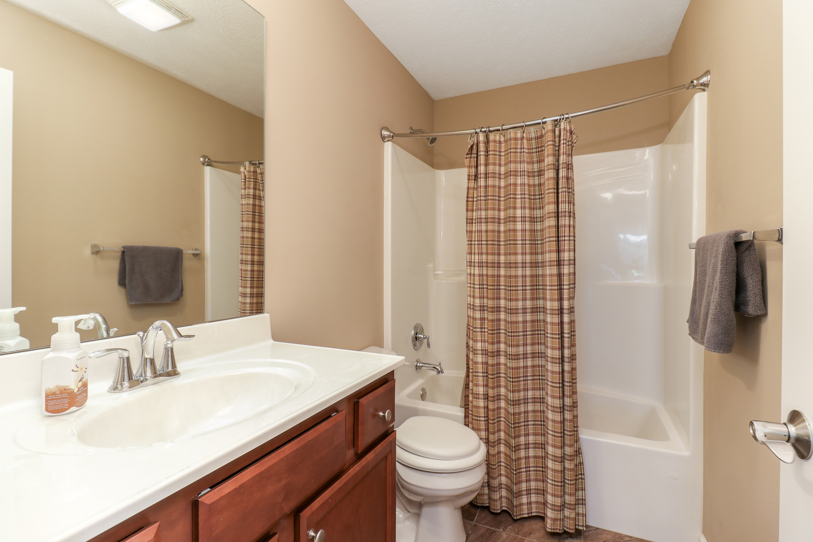 51 Winding Way Bloomington, IL 61705 - Photo 16 of 39 a bathroom with a sink toilet and shower