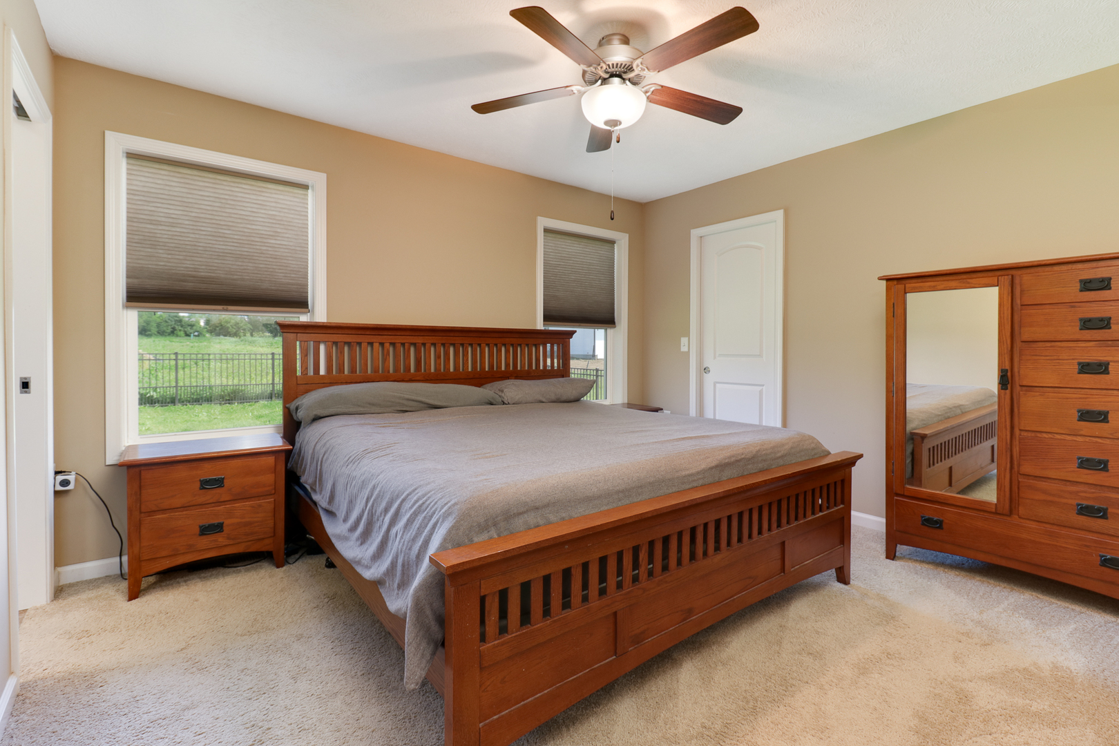 51 Winding Way Bloomington, IL 61705 - Photo 18 of 39 a bedroom with a bed and a dresser