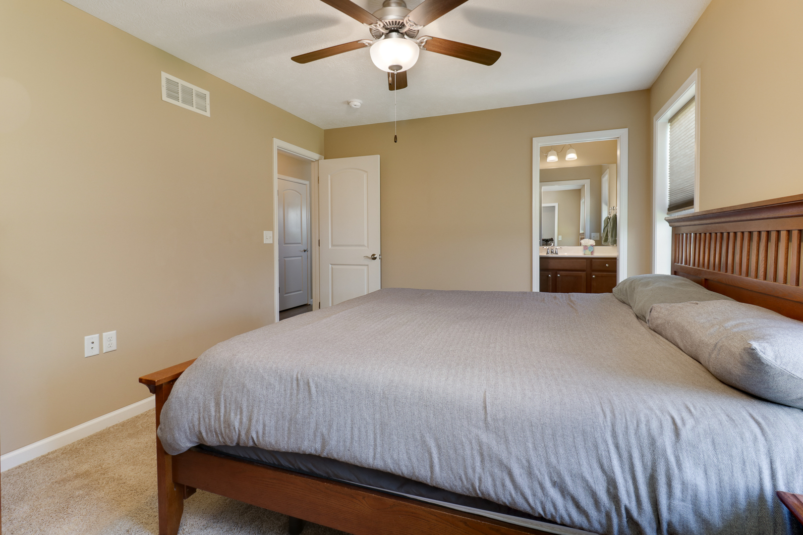 51 Winding Way Bloomington, IL 61705 - Photo 19 of 39 a bedroom with a bed and window