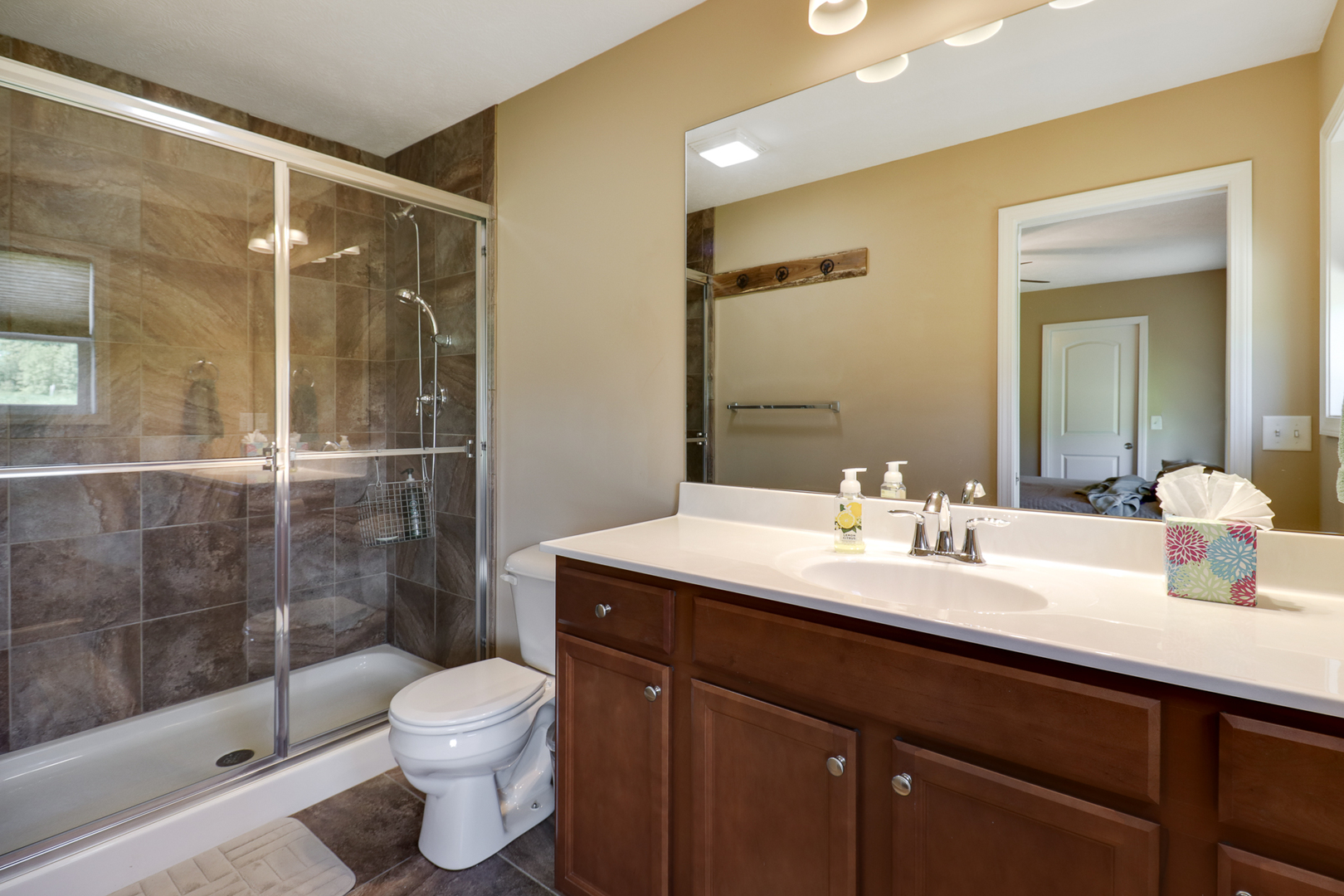 51 Winding Way Bloomington, IL 61705 - Photo 20 of 39 a bathroom with a sink a toilet and shower