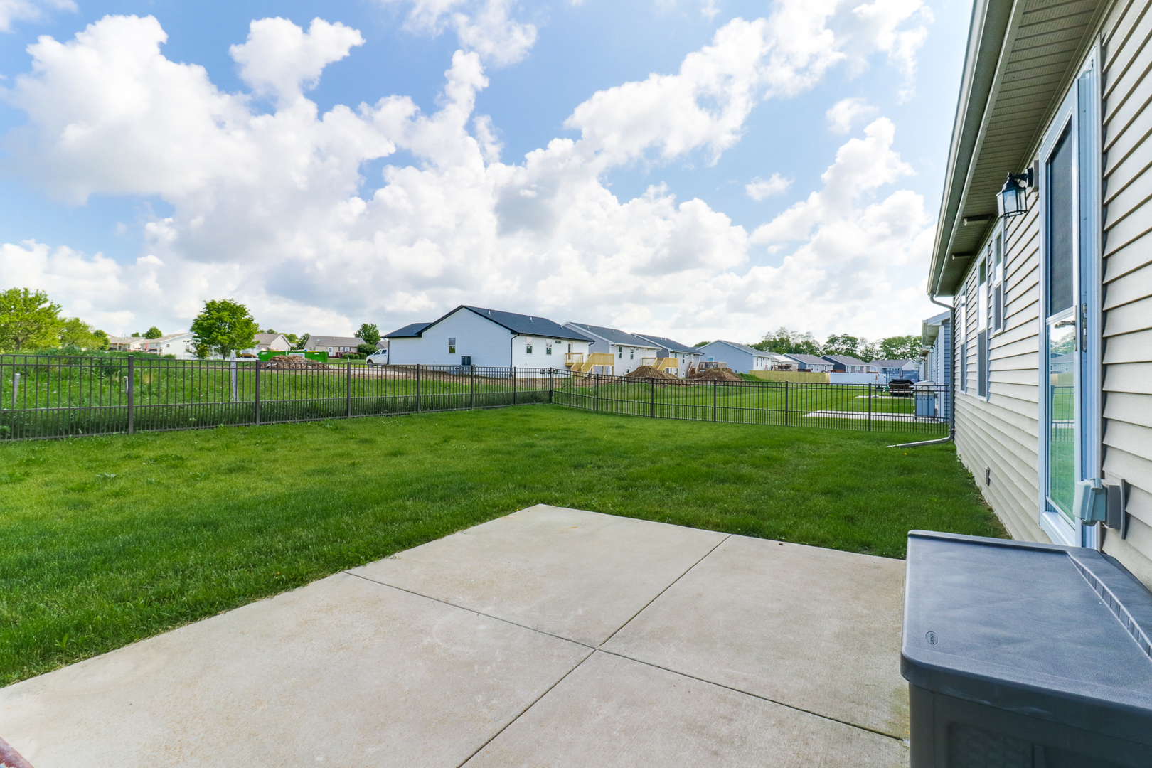 51 Winding Way Bloomington, IL 61705 - Photo 25 of 39 a view of a garden with a fountain