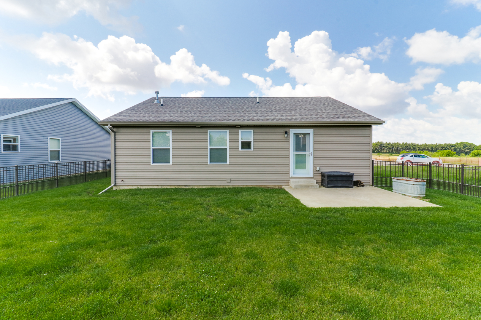 51 Winding Way Bloomington, IL 61705 - Photo 26 of 39 a view of a house with a backyard